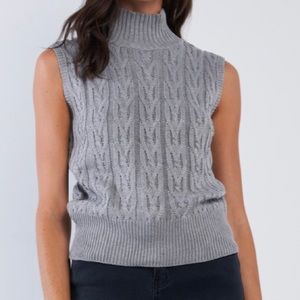 Knitted turtleneck vest